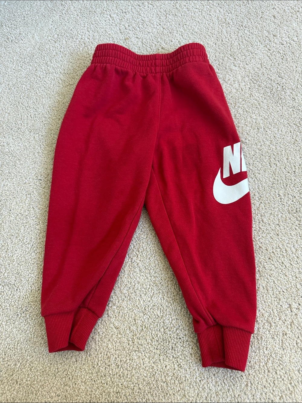 Nike Red Kids Sweatpants with White Swoosh